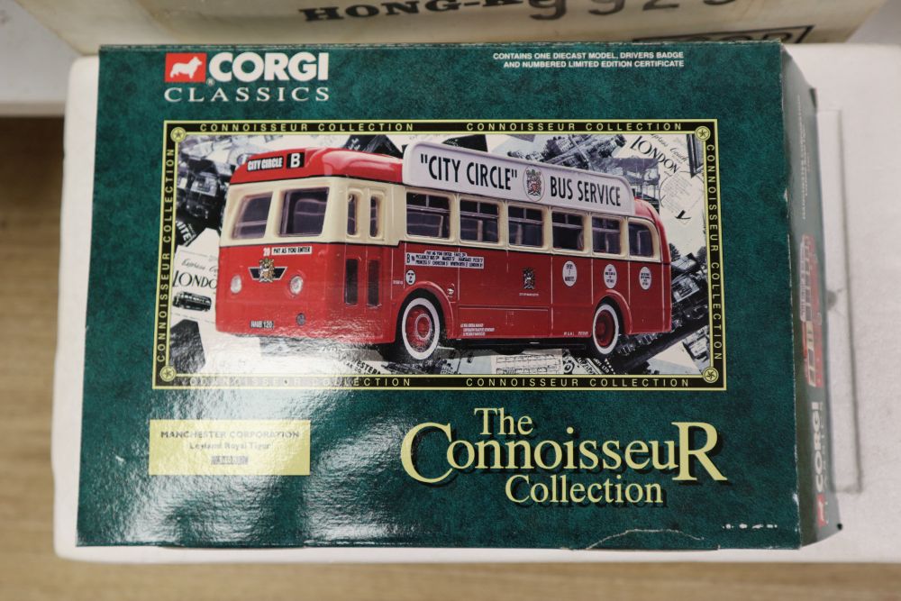 A collection of sixteen Matchbox die cast buses and other vehicles, many with original boxes